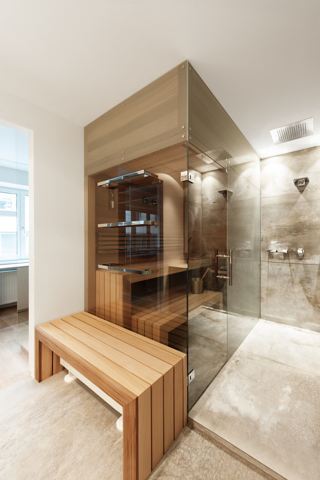 Photo of a mid-sized modern bathroom in Other with recessed-panel cabinets, beige cabinets, an open shower, gray tile, ceramic tile, white walls, ceramic floors, with a sauna, laminate benchtops and a hinged shower door.