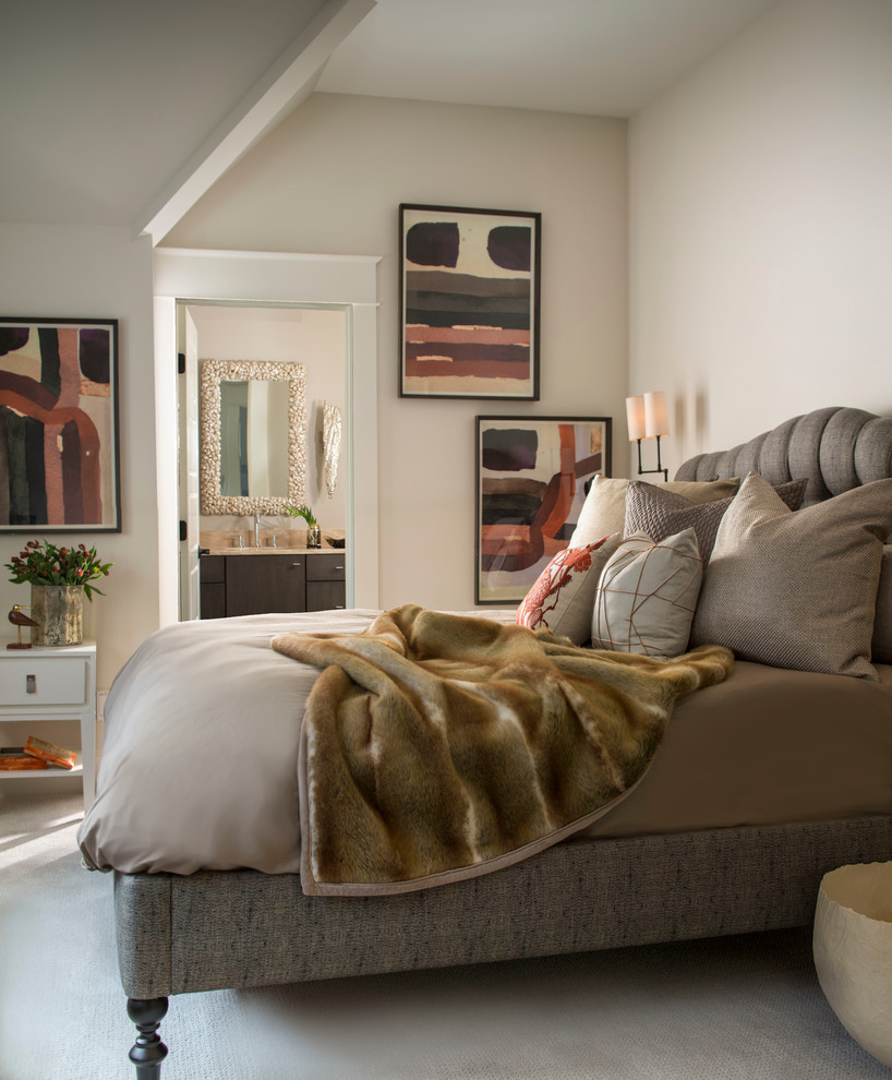 Design ideas for a transitional bedroom in Raleigh with beige walls and carpet.