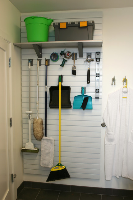 DIY Garage Pegboard Organizer For Brooms And Cleaning Supplies