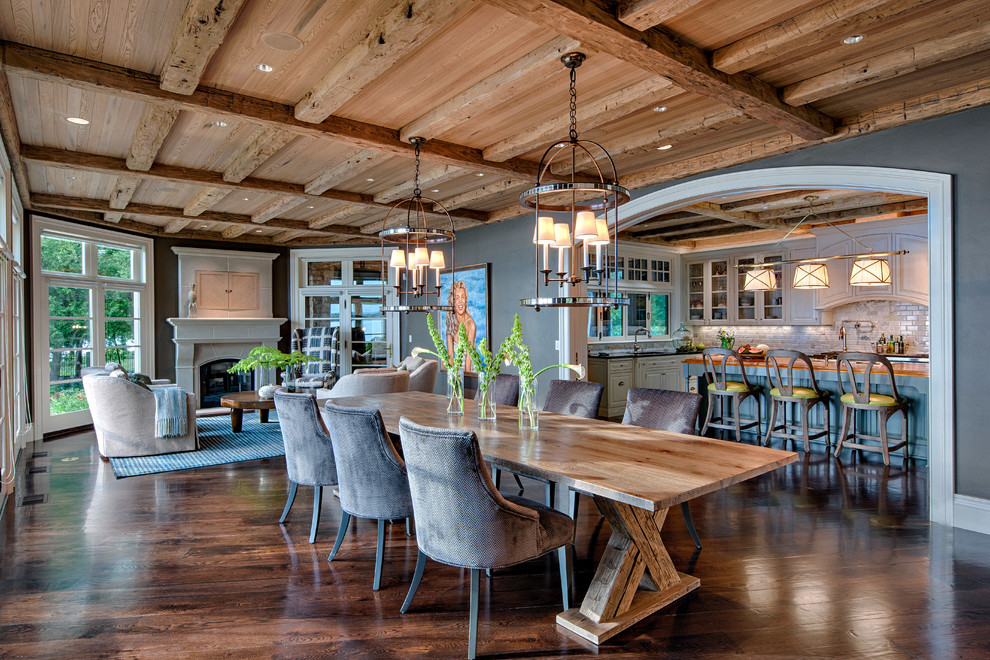 Design ideas for a country open plan dining in Other with grey walls and dark hardwood floors.