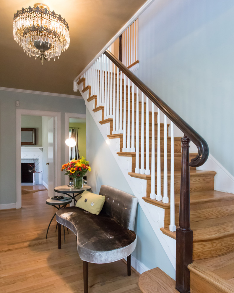 Inspiration for a mid-sized traditional foyer in DC Metro with blue walls and medium hardwood floors.