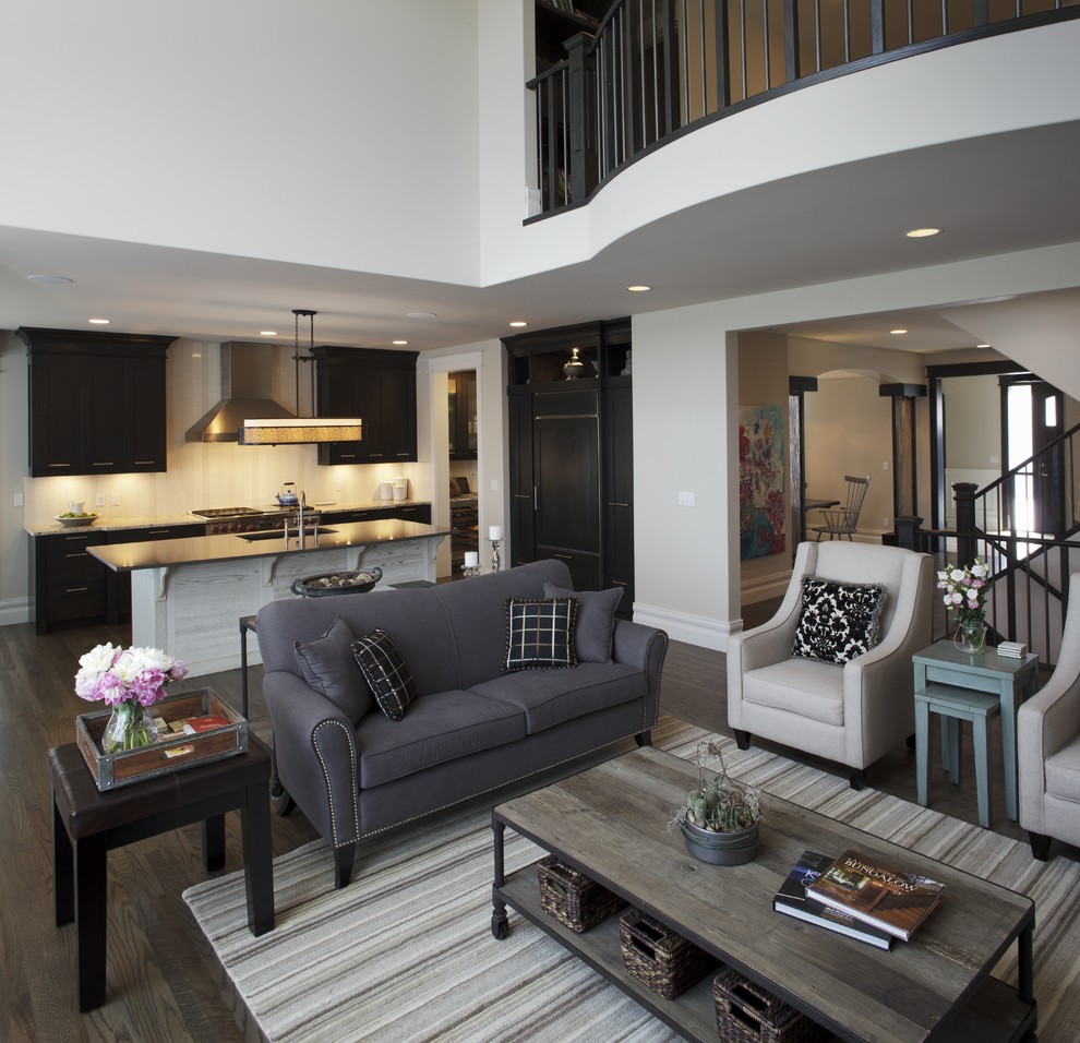 Photo of a transitional open concept living room in Calgary.