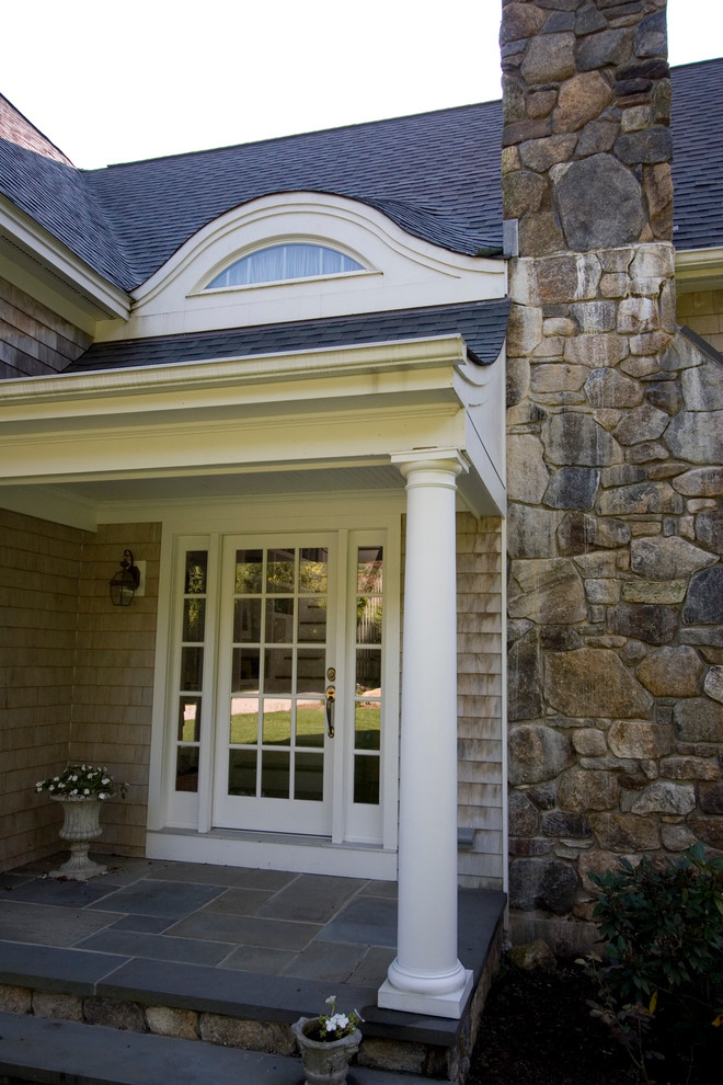 This is an example of a mid-sized traditional front door in Providence with a single front door and a white front door.