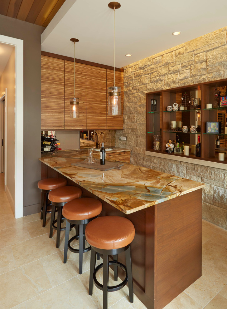 Design ideas for a contemporary l-shaped seated home bar in Chicago with an undermount sink, flat-panel cabinets, medium wood cabinets, beige floor and brown benchtop.