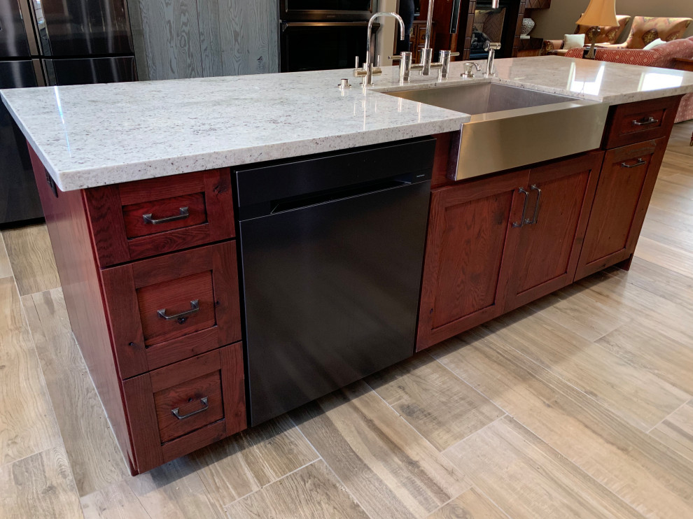 Mid-sized mountain style kitchen photo in Las Vegas with shaker cabinets, red cabinets and an island