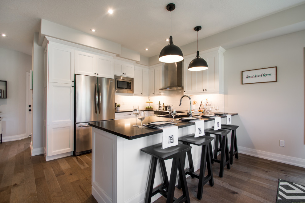 Example of a mountain style kitchen design in Toronto