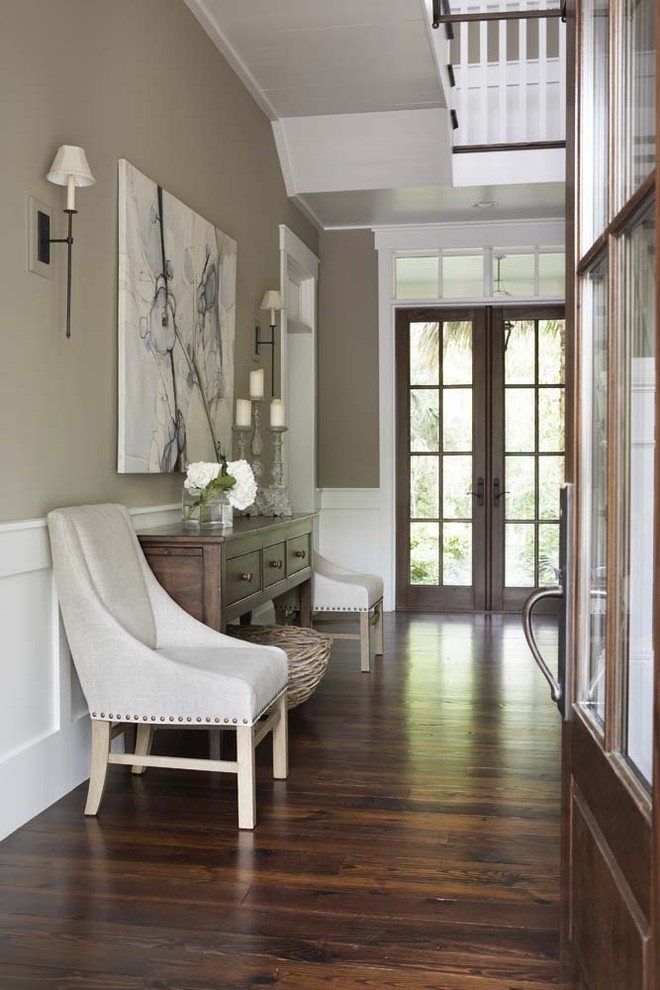 Design ideas for a mid-sized traditional entryway in Charleston with beige walls, dark hardwood floors, a double front door and a dark wood front door.