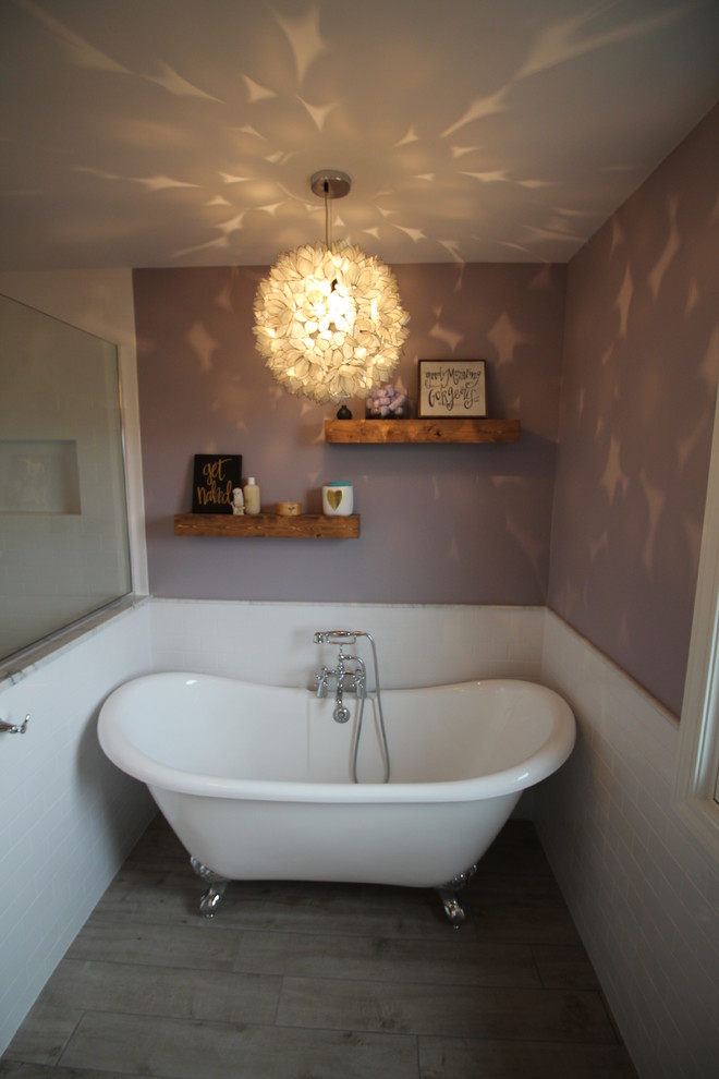 Design ideas for a mid-sized traditional master bathroom in Nashville with shaker cabinets, white cabinets, a claw-foot tub, an alcove shower, a one-piece toilet, white tile, subway tile, purple walls, porcelain floors, an undermount sink and marble benchtops.