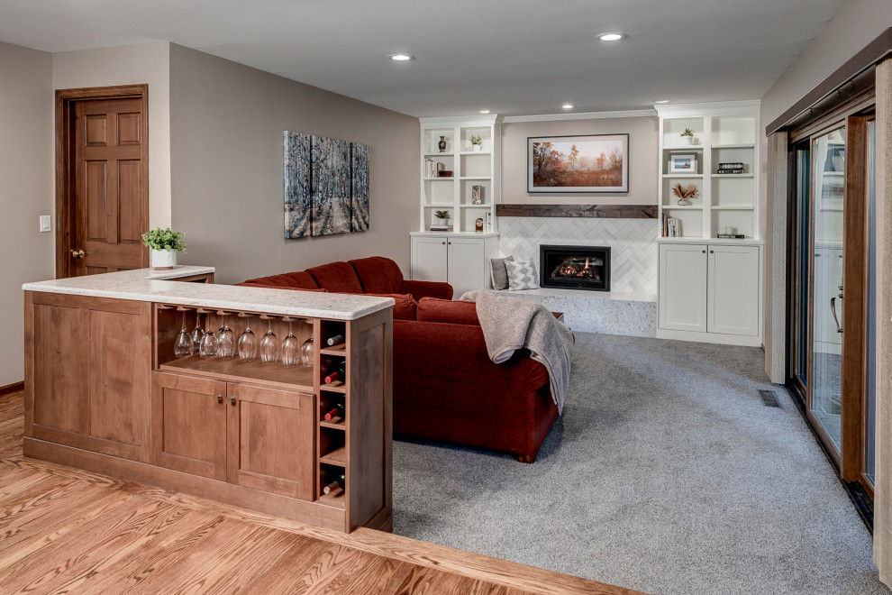 Inspiration for a mid-sized transitional open concept carpeted and gray floor family room library remodel in Seattle with gray walls, a standard fireplace, a tile fireplace and a wall-mounted tv