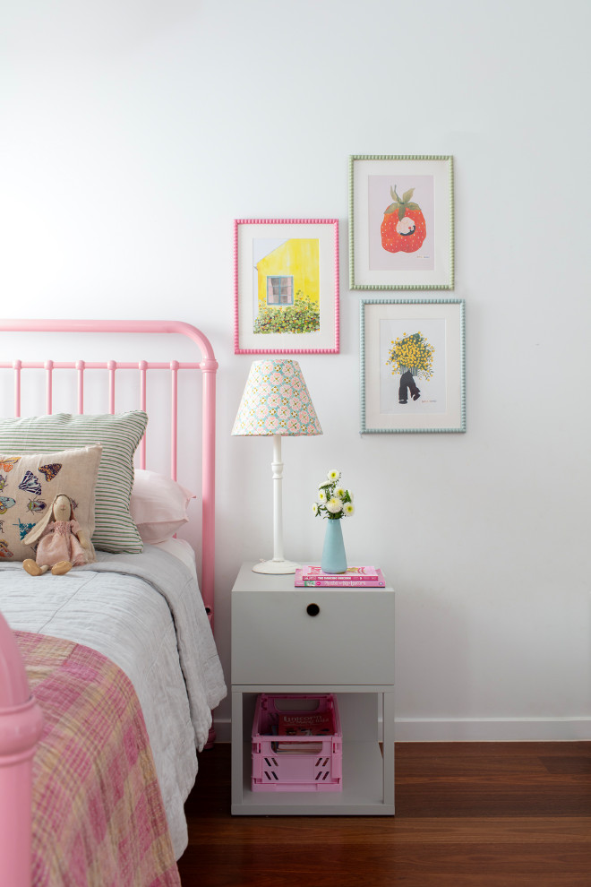 Photo of a beach style kids' room in Brisbane.