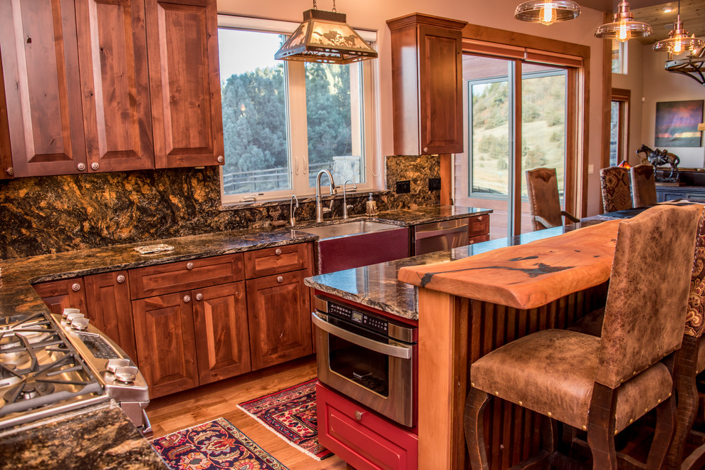 Example of a mountain style kitchen design in Denver