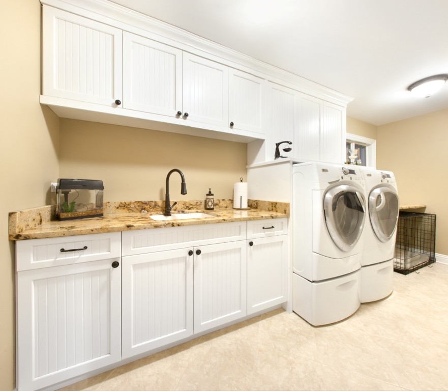 This is an example of an arts and crafts laundry room in Chicago.
