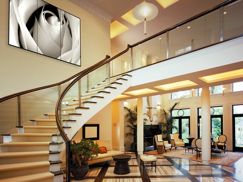 Design ideas for a large contemporary foyer in Vancouver with yellow walls and ceramic floors.