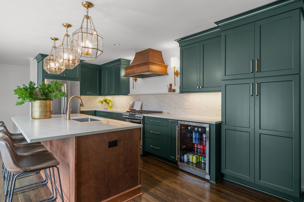 Eat-in kitchen - large transitional medium tone wood floor eat-in kitchen idea in Birmingham with an undermount sink, flat-panel cabinets, green cabinets, marble countertops, white backsplash, marble backsplash, stainless steel appliances, an island and white countertops