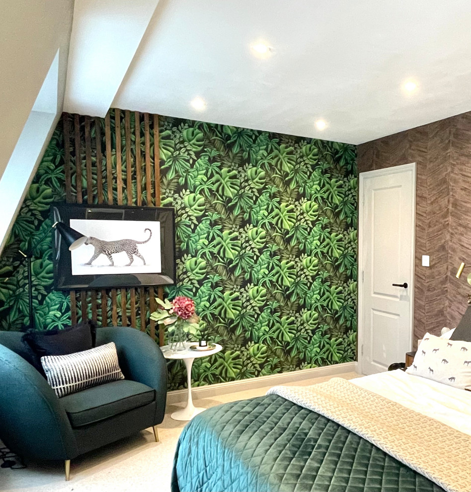Example of a mid-sized minimalist master carpeted, beige floor and wallpaper bedroom design in London with green walls