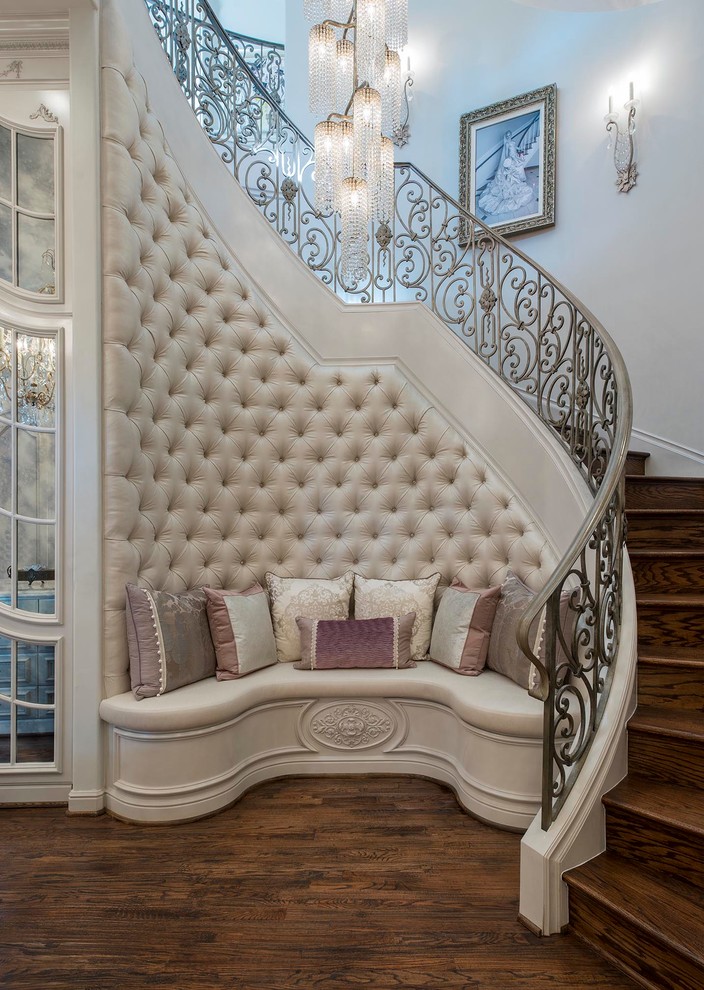 Inspiration for a traditional wood curved staircase in Dallas with wood risers.