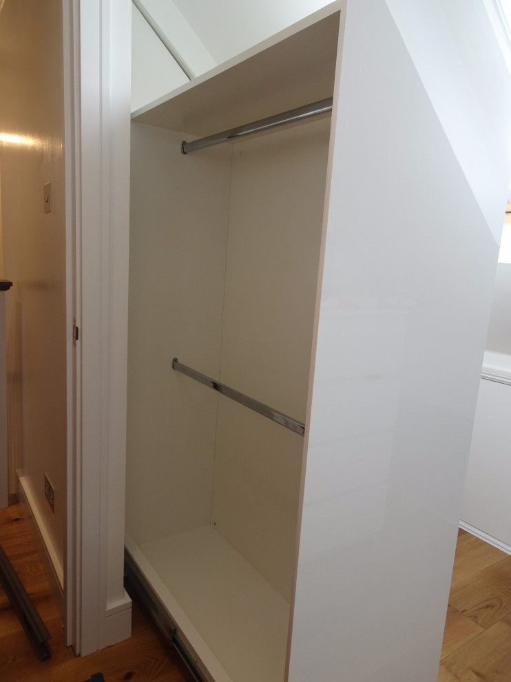 Sliding drawer storage for pitched roof space