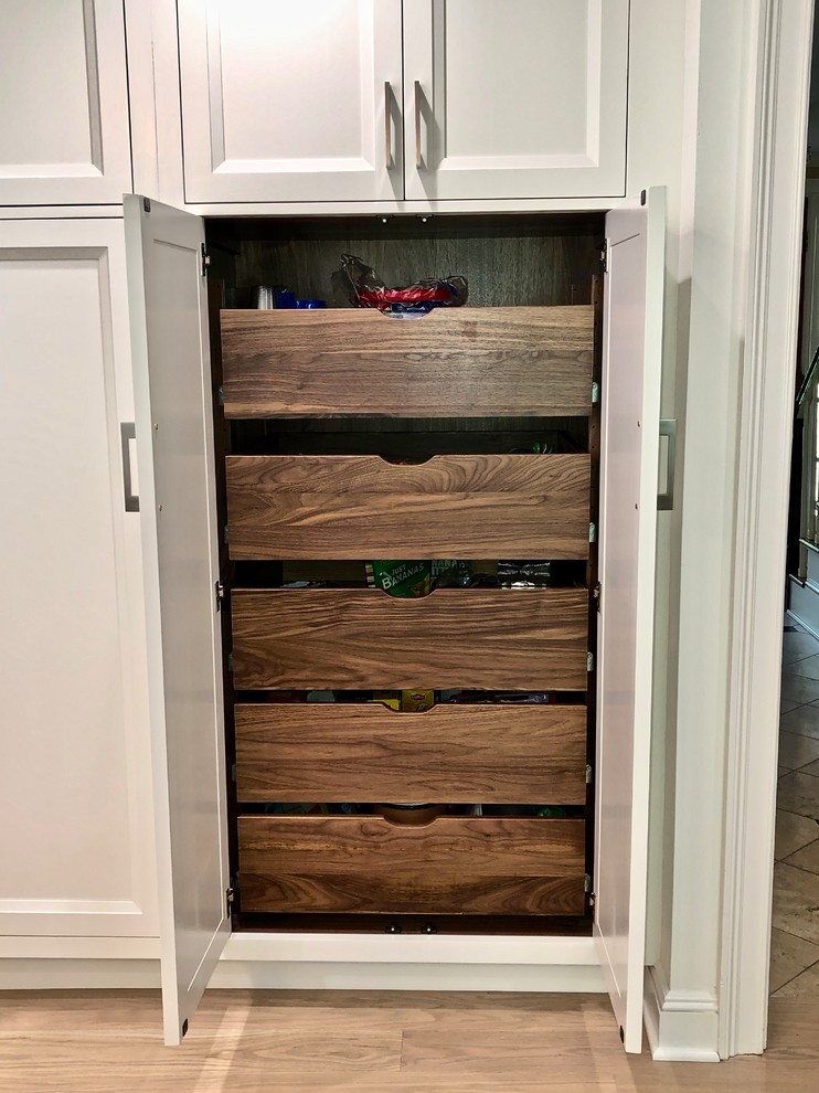 Inspiration for a large transitional eat-in kitchen remodel in New York with beaded inset cabinets, gray cabinets, quartz countertops and an island