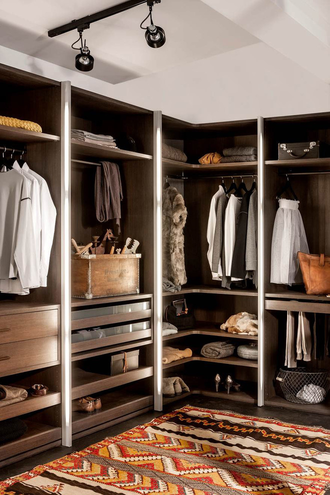Photo of a large contemporary gender-neutral walk-in wardrobe in Boston with open cabinets, brown cabinets, dark hardwood floors and brown floor.
