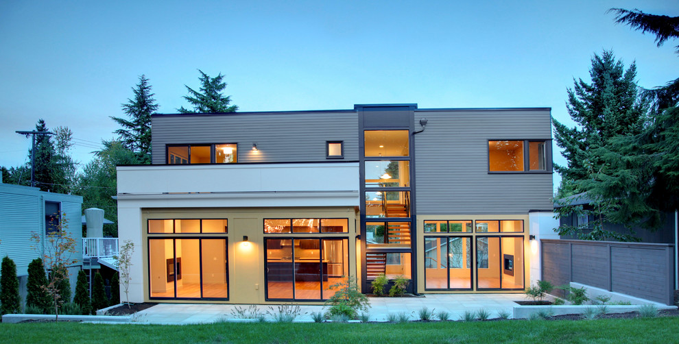 Design ideas for a contemporary two-storey exterior in Seattle.