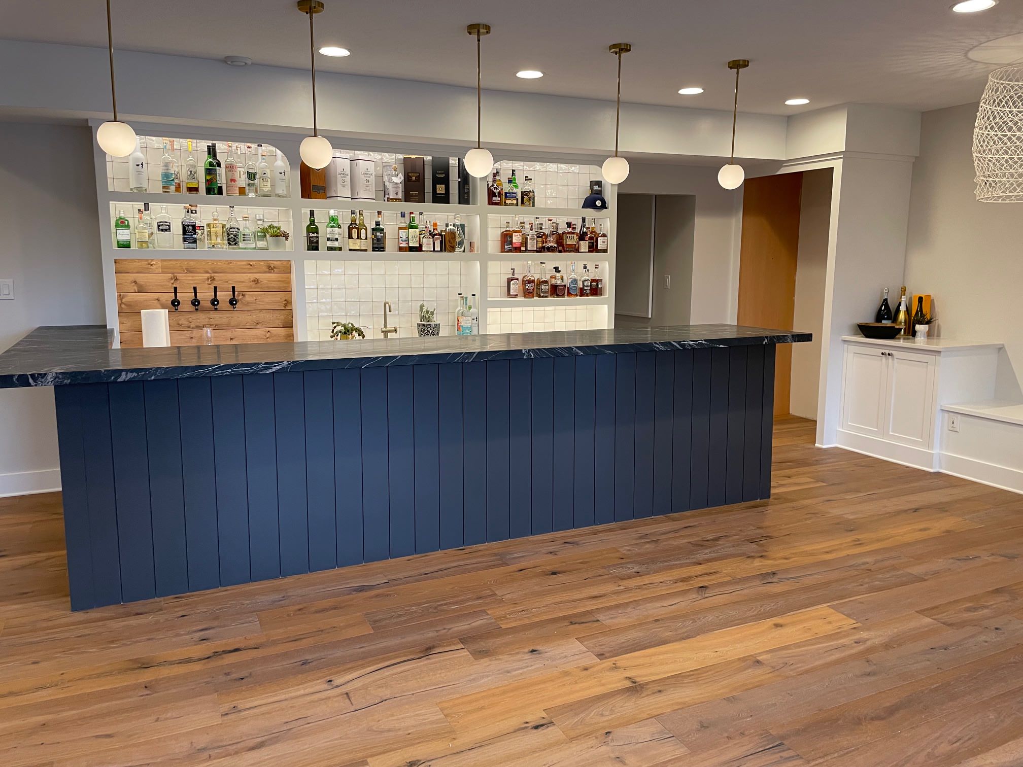 Finished Basement in Marshall Township With Custom Bar and Beer Tap