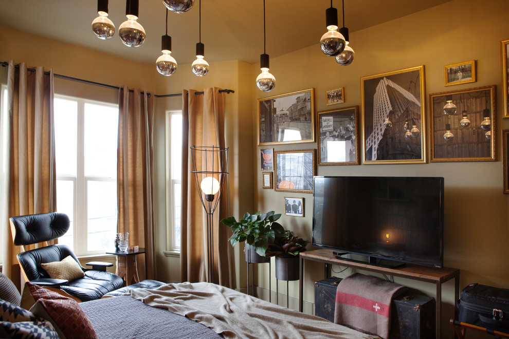 Inspiration for an eclectic bedroom in San Francisco with brown walls.