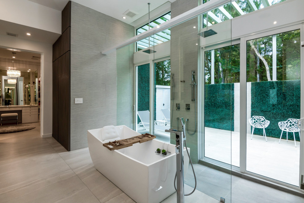 This is an example of an expansive modern master bathroom in DC Metro with a double shower, brown tile and an open shower.