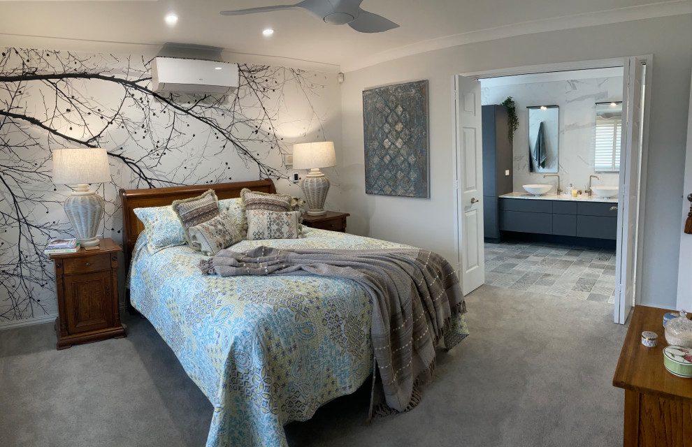 Design ideas for an eclectic master bedroom in Perth with carpet, grey floor and wallpaper.