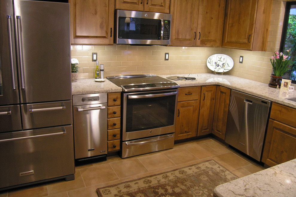Example of a transitional kitchen design in Sacramento