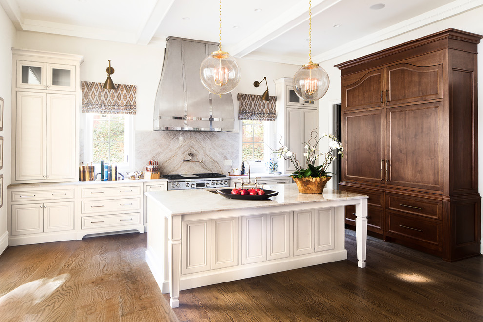 Inspiration for a timeless medium tone wood floor kitchen remodel in Atlanta with quartzite countertops, stone slab backsplash, an island, an undermount sink, recessed-panel cabinets, white cabinets, multicolored backsplash and stainless steel appliances