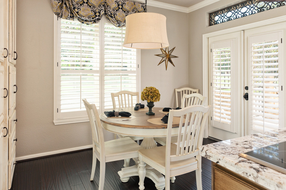 Photo of a traditional dining room in Houston with grey walls.