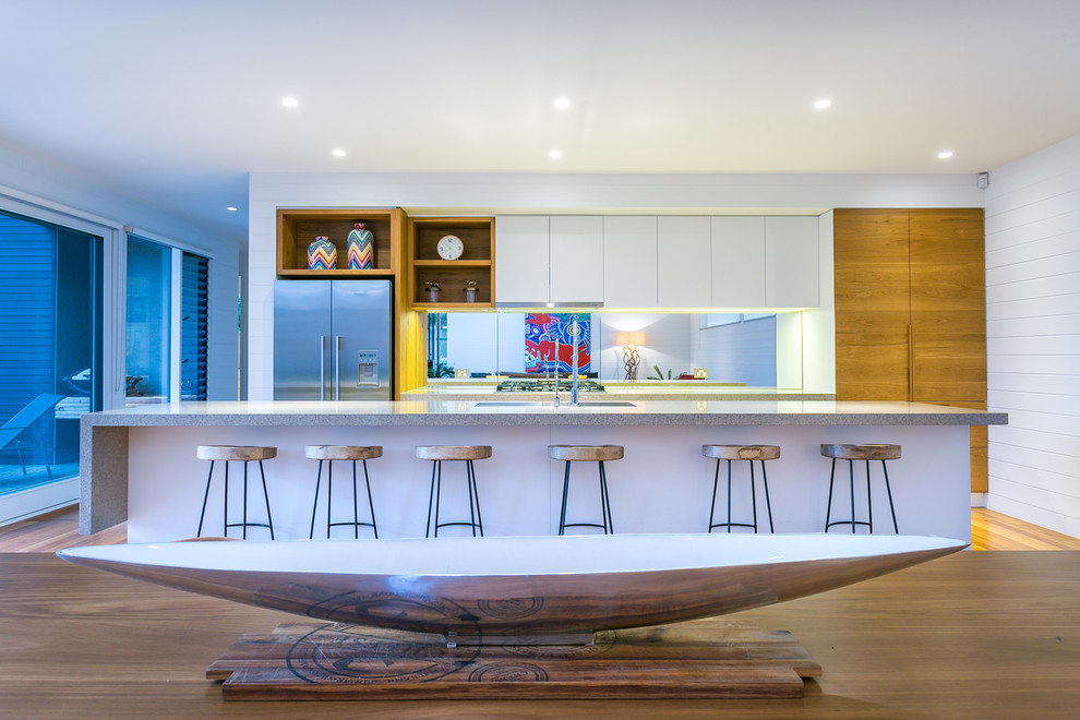 Design ideas for a large contemporary galley open plan kitchen in Melbourne with with island.
