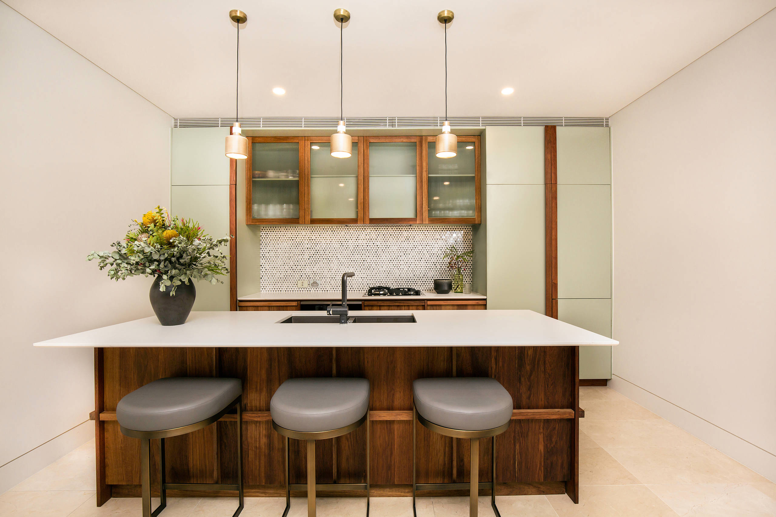 Mid-sized trendy beige floor kitchen