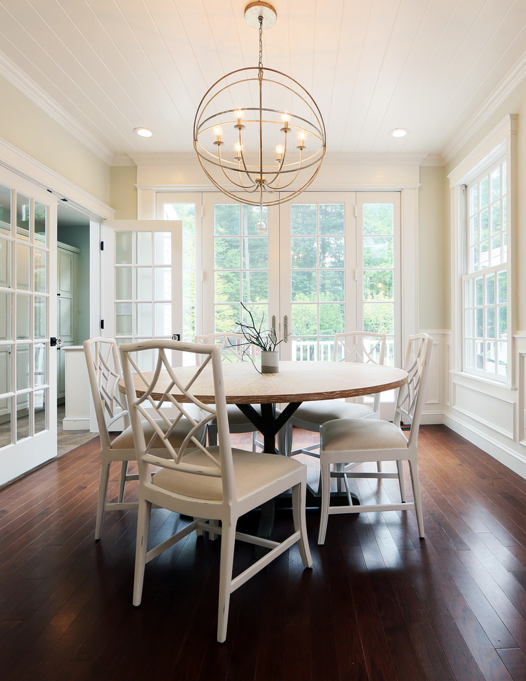 Enclosed dining room - mid-sized transitional dark wood floor and brown floor enclosed dining room idea in Boston with beige walls and no fireplace