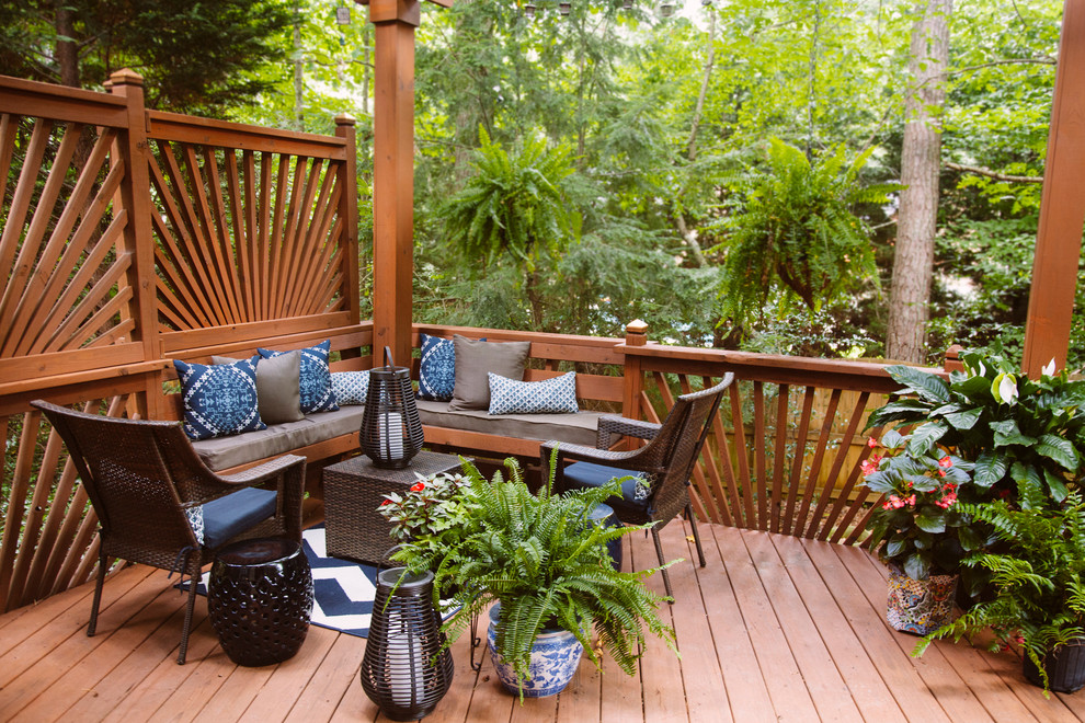 Mid-sized transitional backyard deck in Atlanta with a container garden and a pergola.