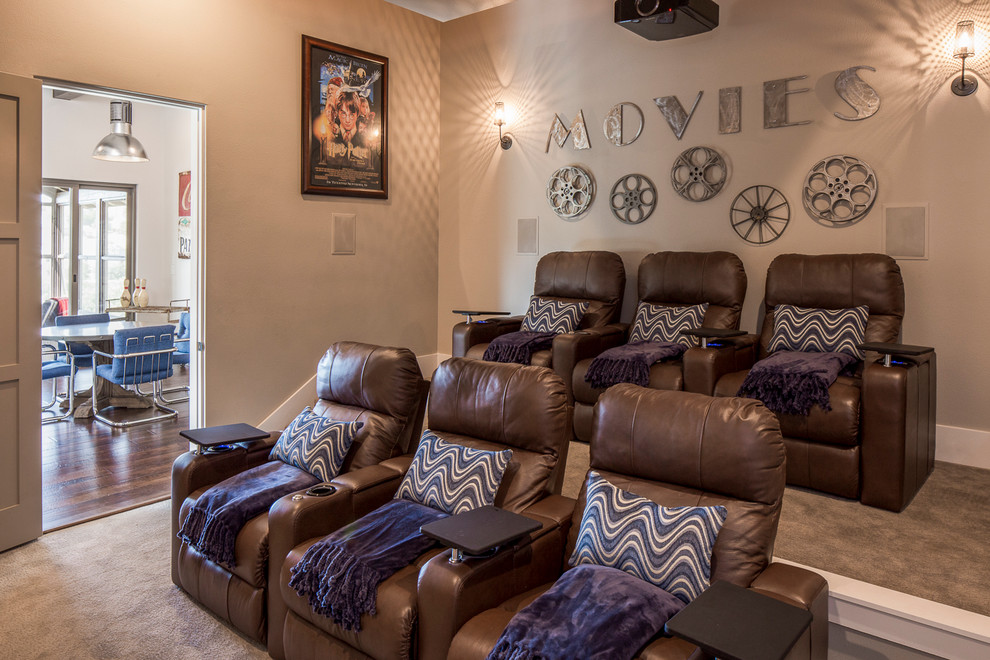 Large traditional enclosed home theatre in Austin with carpet, a projector screen, beige floor and grey walls.