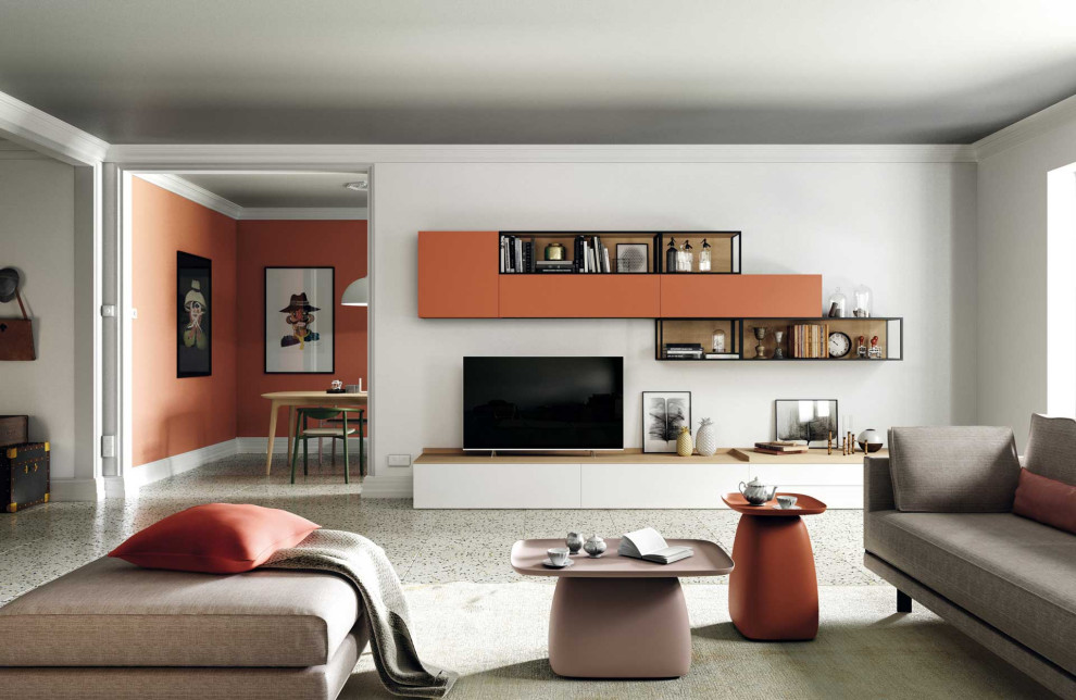 Immagine di un grande soggiorno boho chic aperto con libreria, pareti rosa, pavimento con piastrelle in ceramica, TV autoportante, pavimento grigio e tappeto