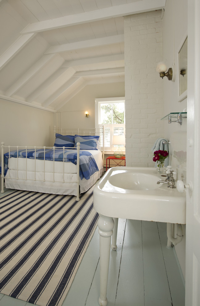 Inspiration for a mid-sized beach style guest bedroom in Boston with painted wood floors, beige walls, no fireplace and blue floor.
