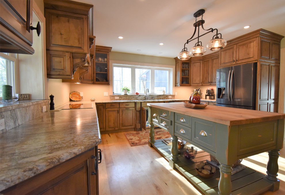 Huge mountain style kitchen photo with distressed cabinets