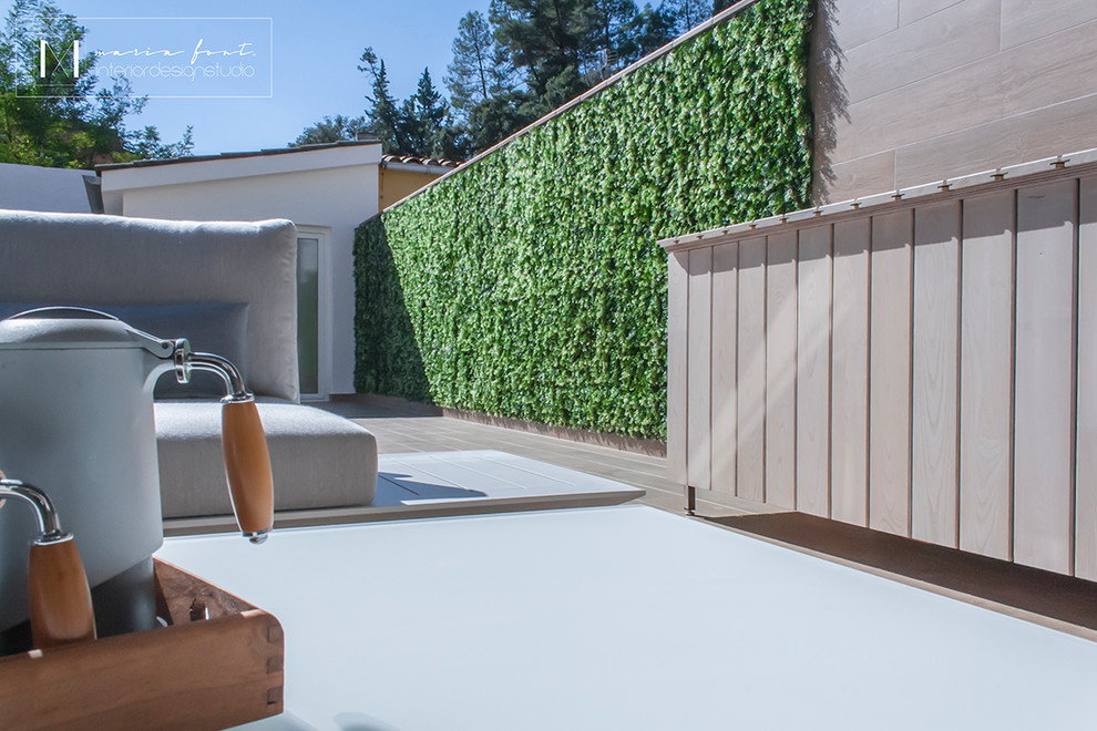 Ejemplo de terraza in patio trasero With toldo