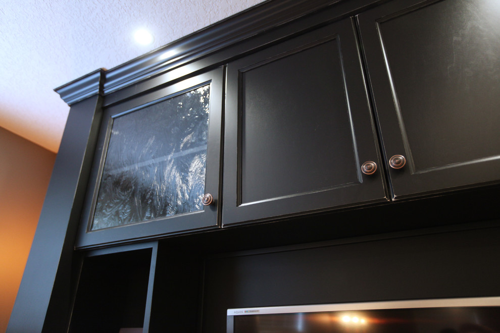 Example of a transitional home theater design in Calgary