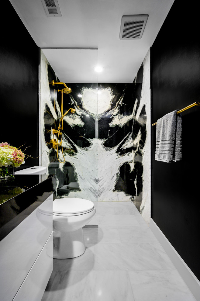 Bathroom - mid-sized modern 3/4 marble tile white floor, single-sink and ceramic tile bathroom idea in Dallas with flat-panel cabinets, white cabinets, a two-piece toilet, black walls, a trough sink, marble countertops, black countertops and a floating vanity