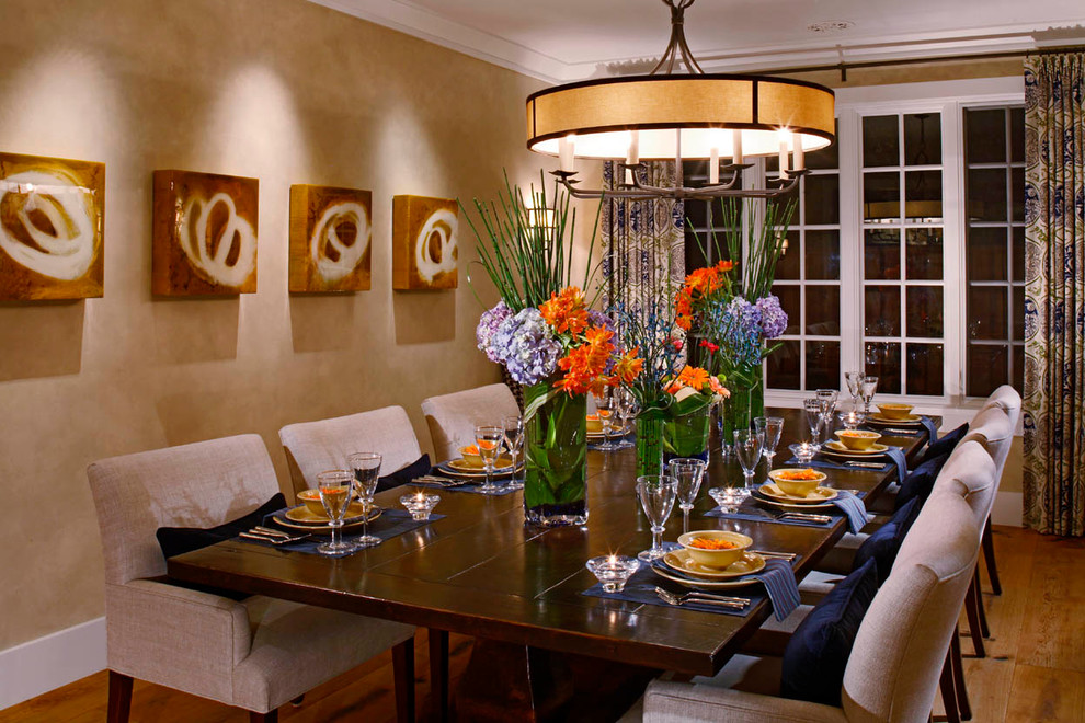Inspiration for a traditional dining room in Orange County with beige walls.
