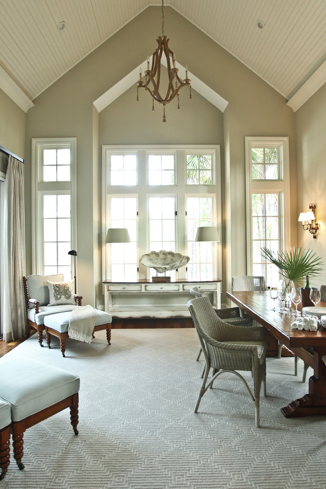 This is an example of a beach style living room in Charleston with beige walls.