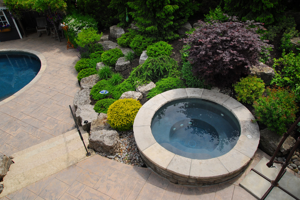 Photo of a large rustic partial sun backyard stone outdoor basketball/tennis/multi-game court in Toronto for summer.