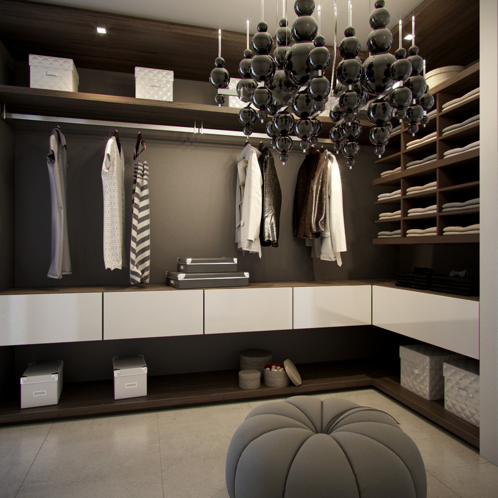 Photo of a contemporary walk-in wardrobe in Miami with open cabinets, dark wood cabinets and concrete floors.