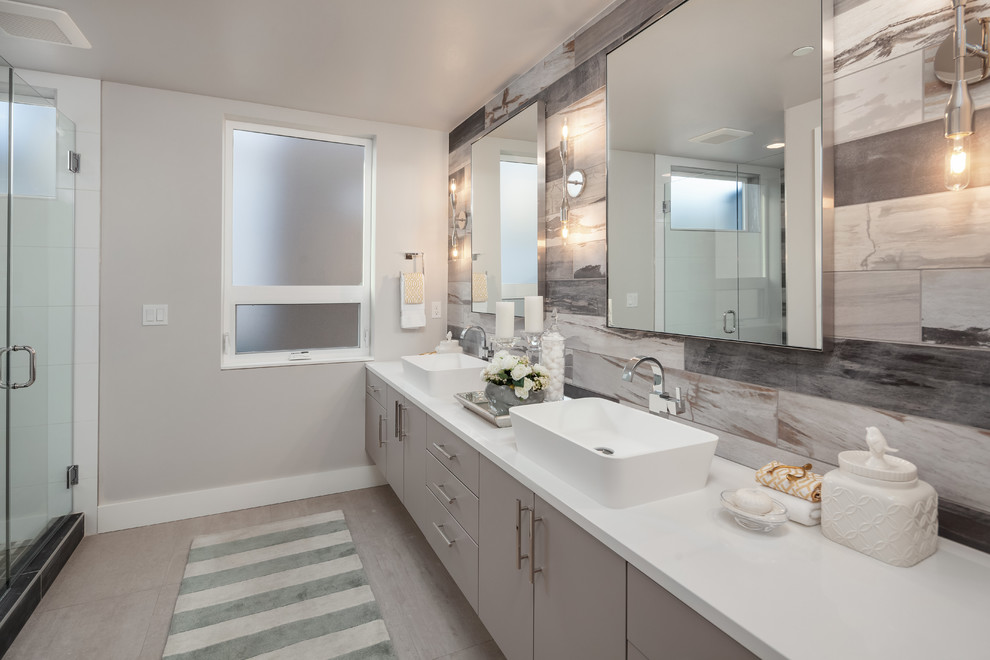 Contemporary bathroom in Seattle with a curbless shower, a two-piece toilet, porcelain tile, porcelain floors, a vessel sink, quartzite benchtops, a sliding shower screen and white benchtops.