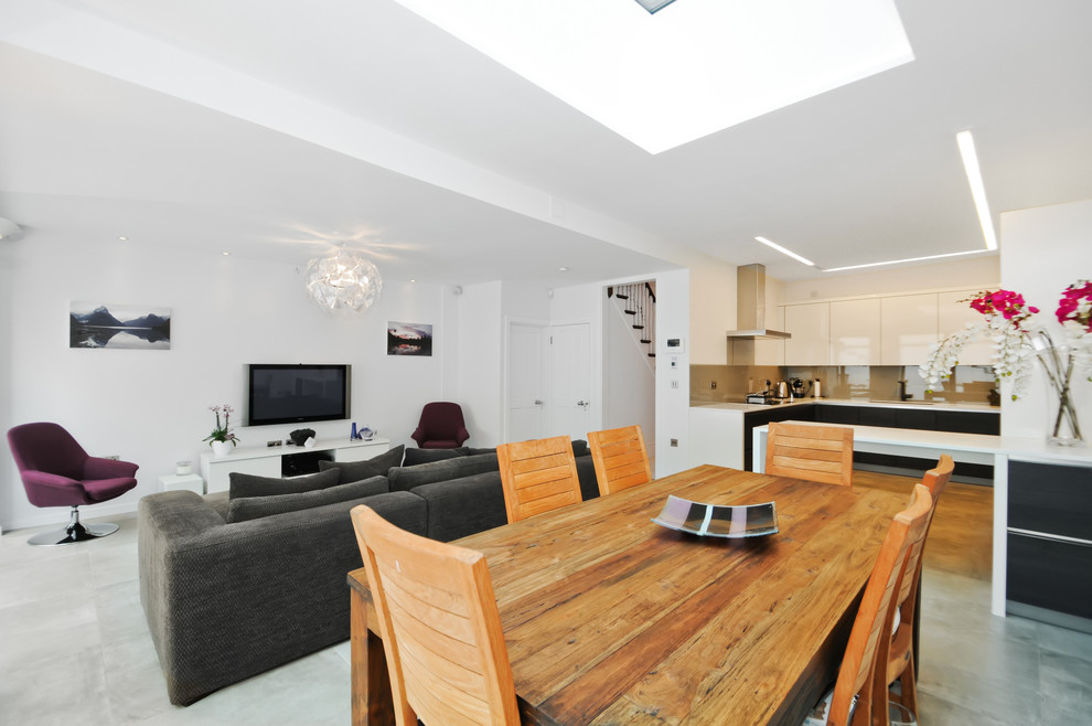 Photo of a contemporary open plan dining in London.