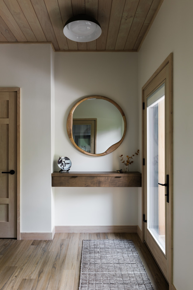 Example of a transitional entryway design in Other