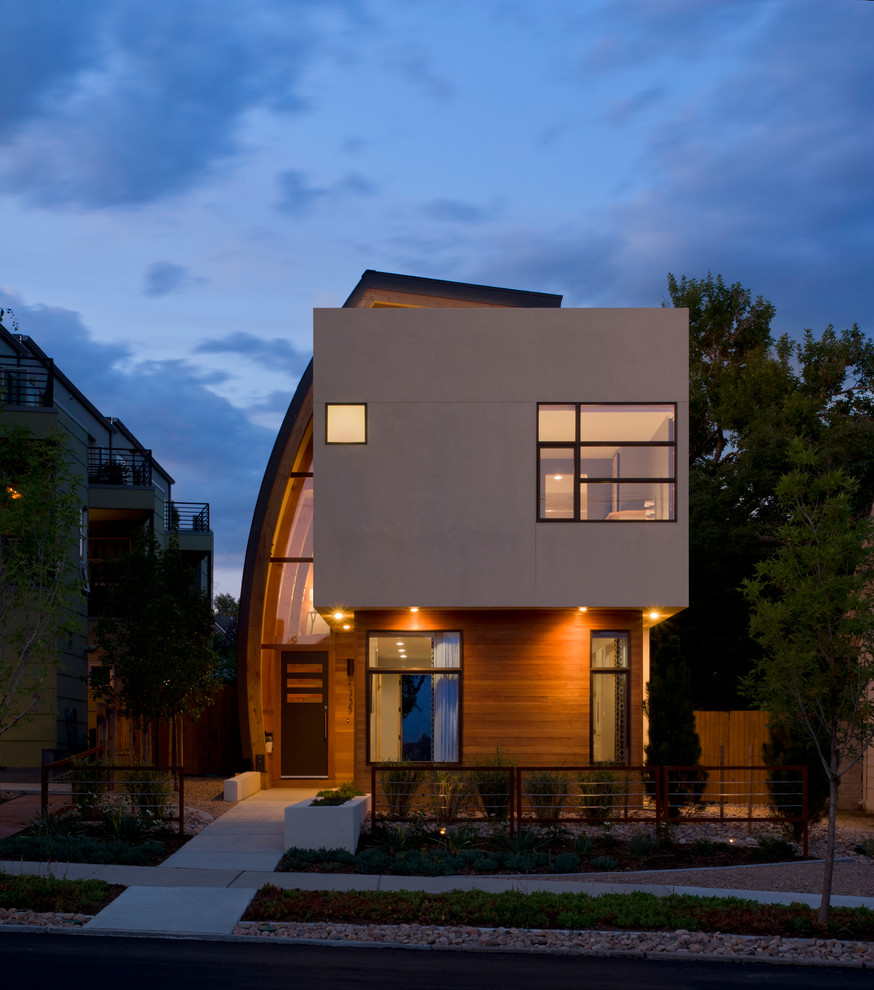 Contemporary exterior in Denver with wood siding.